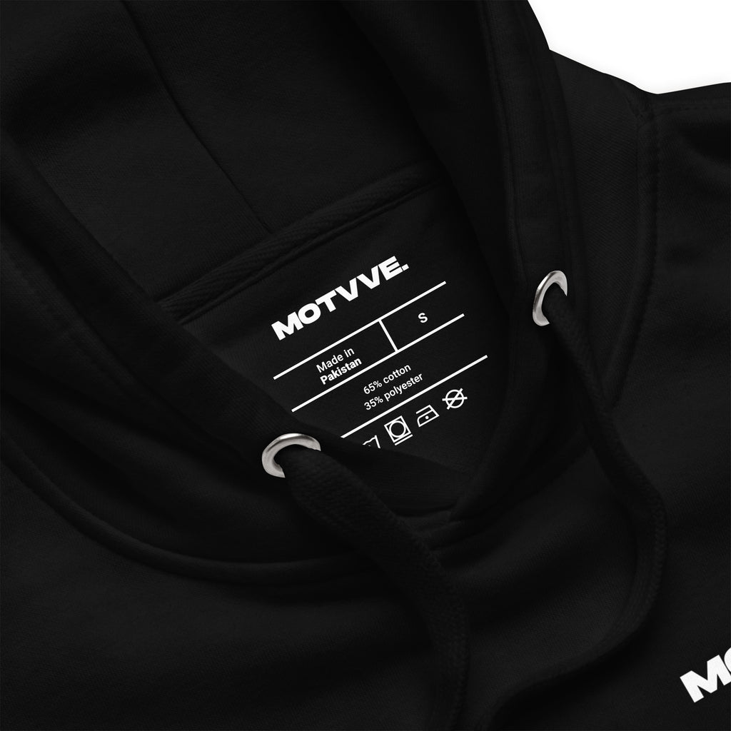 Black hoodie with a visible label displaying 'MOTVVE' branding.