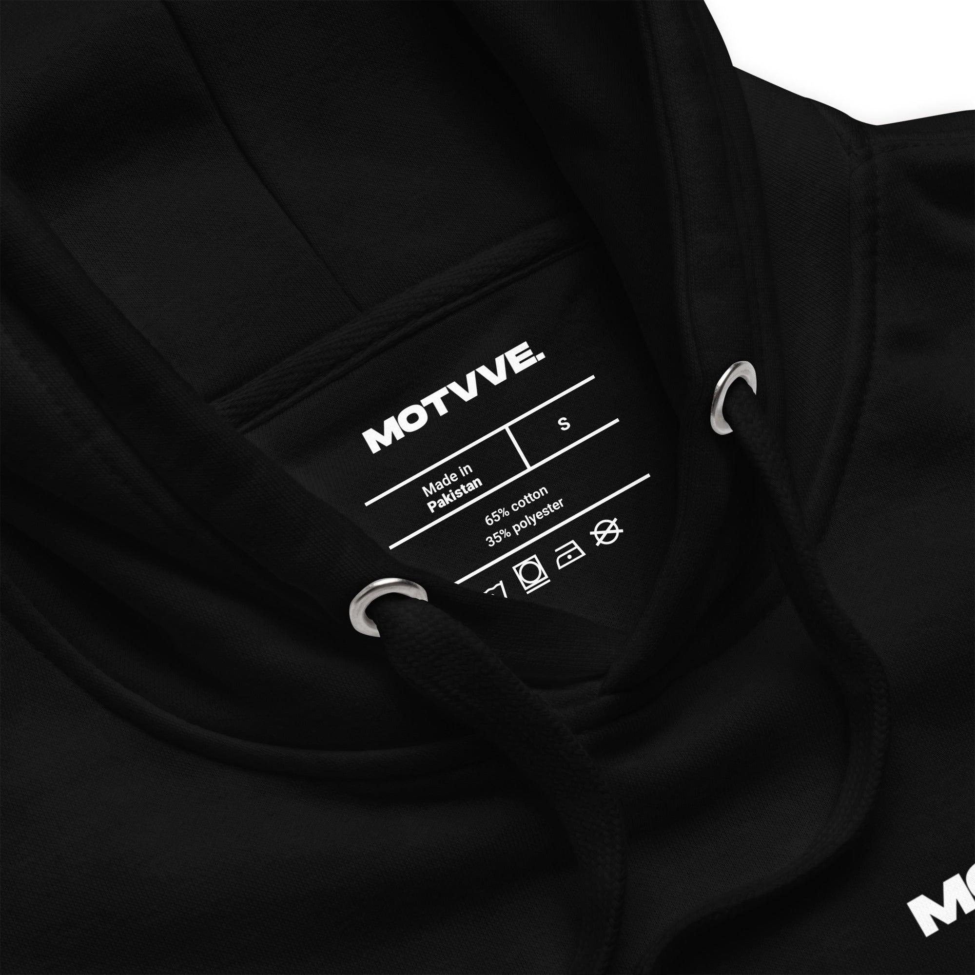 Black hoodie with a visible label displaying 'MOTVVE' branding.