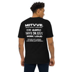 Person wearing a black t-shirt with white text on the back saying 'MOTVVE', standing against a white background