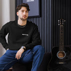 Model wearing MOTVVE unisex eco black sweatshirt